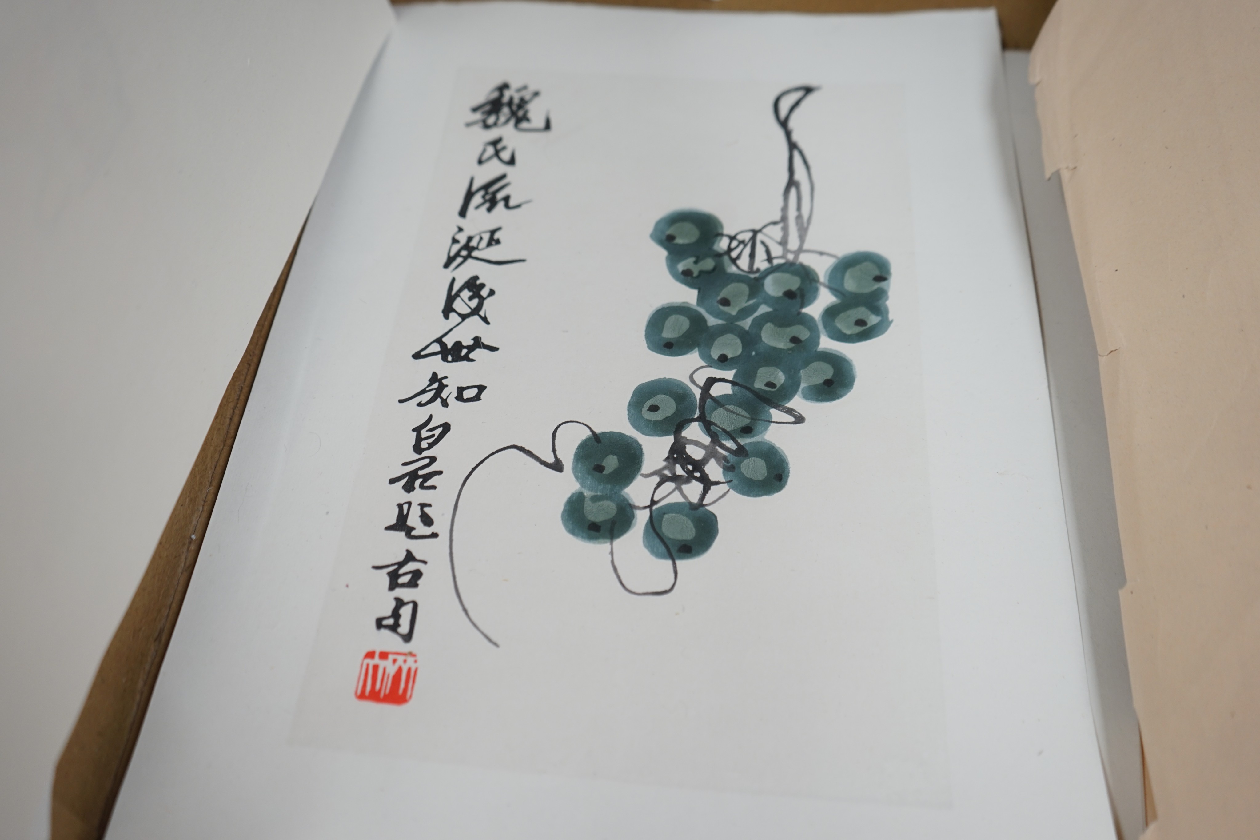 An album of Chinese prints, dated 1954 including Qi Baishi